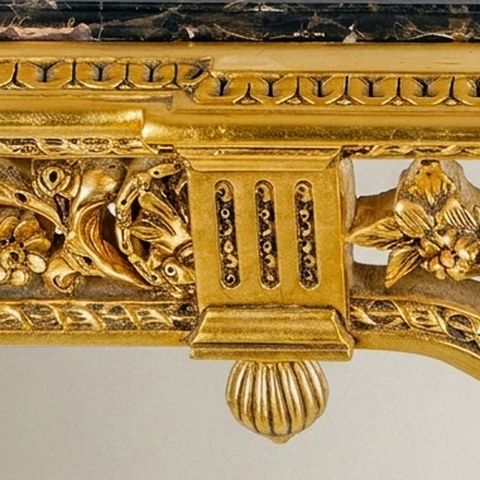 Gold leaf on carved wood specimen