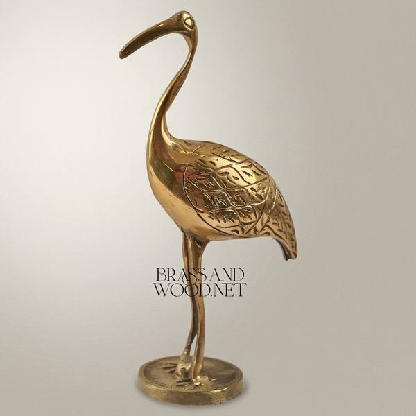 Handcrafted Brass Crane Sculpture with Engraved Foliage Body — handcrafted by Brass & Wood
